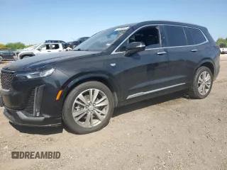 2021 Cadillac XT6 Premium Luxury with VIN 1GYKPCRS4MZ199110, listed as a Copart auction lot 51798905 with 66,486 mi miles and Salvage Title. Bid and sale history available at DreamBid. Image 1.