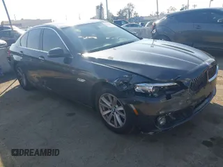 2015 BMW 5 Series 528i with VIN WBA5A5C55FD518546, listed as a IAAI auction lot 41437066 with 135,586 mi miles. Bid and sale history available at carsss.com. Image 1.