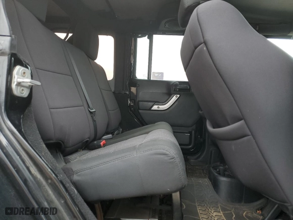 2011 Jeep Wrangler Unlimited Sahara with VIN 1J4HA5H14BL507148, listed as a Copart auction lot 52480325 with 233,835 mi miles and Clean Title. Bid and sale history available at carsss.com. Image 11.