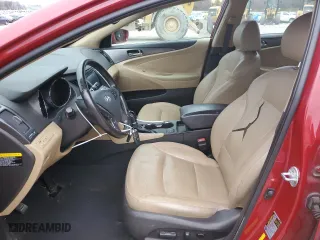 2013 Hyundai Sonata Hybrid with VIN KMHEC4A49DA081128, listed as a Copart auction lot 44517285 with 130,565 mi miles and Clean Title. Bid and sale history available at carsss.com. Image 7.