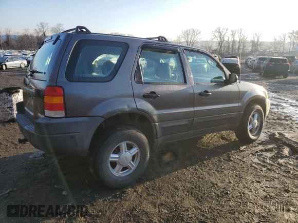 2004 Ford Escape XLS with VIN 1FMCU92134KB88319, listed as a Copart auction lot 84243494 with 158,052 mi miles and Salvage Title. Bid and sale history available at DreamBid. Image 3.