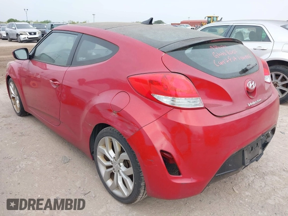 2013 Hyundai Veloster w/Gray Int with VIN KMHTC6AD2DU141462, listed as a IAAI auction lot 42136445 with 122,146 mi miles and . Bid and sale history available at DreamBid. Image 3.