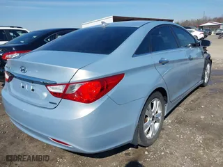 2013 Hyundai Sonata SE with VIN 5NPEC4AC9DH647065, listed as a IAAI auction lot 41636762 with 148,669 mi miles. Bid and sale history available at carsss.com. Image 4.