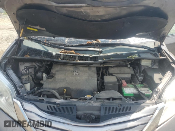 2015 Toyota Sienna XLE with VIN 5TDYK3DC6FS576670, listed as a Copart auction lot 62612345 with 106,475 mi miles and Salvage title. Bid and sale history available at DreamBid. Image 12.