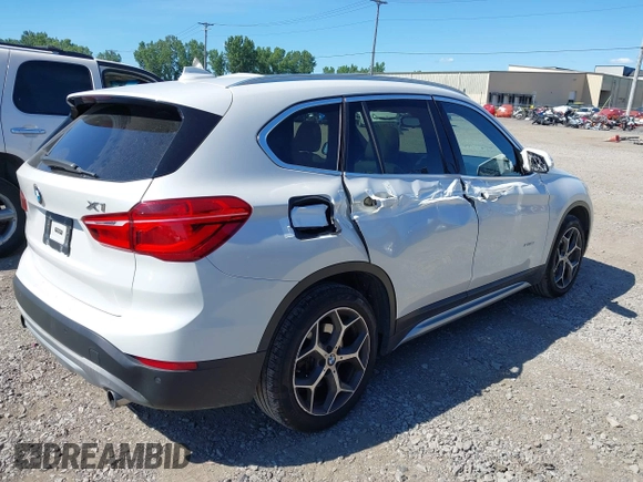 2017 BMW X1 xDrive28i z VIN WBXHT3C32H5F83287, wystawiony jako IAAI lot #42791160 z przebiegiem 69 006 mil mil oraz . Historia ofert i sprzedaży dostępna na DreamBid. Obrazek 4.