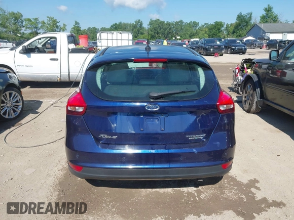 2016 Ford Focus Titanium with VIN 1FADP3N23GL231613, listed as a IAAI auction lot 42645683 with 76,072 mi miles and . Bid and sale history available at DreamBid. Image 17.