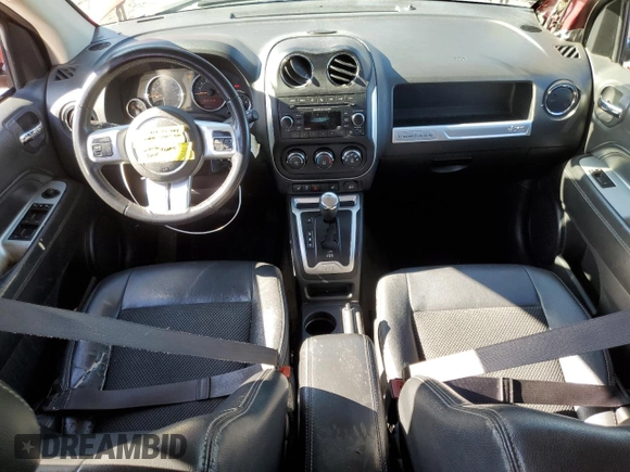 2016 Jeep Compass Latitude z VIN 1C4NJCEA4GD619757, wystawiony jako Copart lot #52113325 z przebiegiem 98 912 mil mil oraz Szkoda całkowita • Salvage title. Historia ofert i sprzedaży dostępna na DreamBid. Obrazek 8.