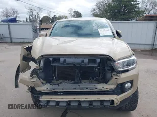 2016 Toyota Tacoma SR5 with VIN 3TMDZ5BN3GM003351, listed as a IAAI auction lot 41721932 with 100,774 mi miles and . Bid and sale history available at DreamBid. Image 13.