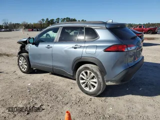 2023 Toyota Corolla Cross LE with VIN 7MUCAAAG8PV060228, listed as a Copart auction lot 86827224 with 40,395 mi miles and Salvage title. Bid and sale history available at DreamBid. Image 2.