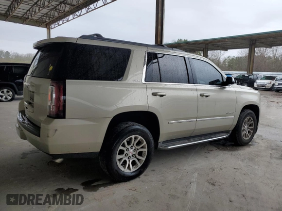 2015 GMC Yukon SLE with VIN 1GKS1AKC5FR120713, listed as a Copart auction lot 48009325 with 133,372 mi miles and Salvage Title. Bid and sale history available at carsss.com. Image 3.