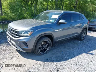 2020 Volkswagen Atlas S with VIN 1V2GC2CA6LC202509, listed as a IAAI auction lot 42388541 with 57,388 mi miles and . Bid and sale history available at DreamBid. Image 2.