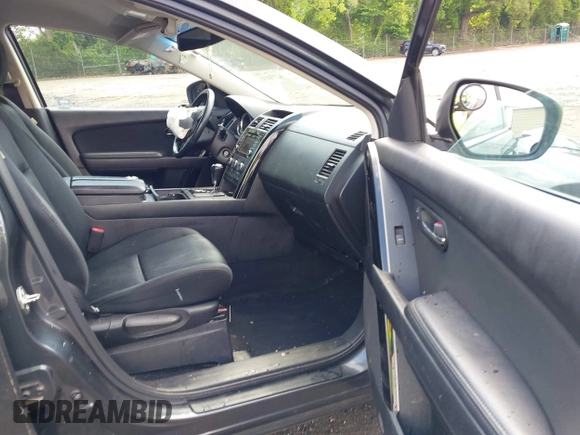 2015 Mazda CX-9 Sport с VIN JM3TB2BA7F0465822, выставлен на аукционе IAAI как лот 42270131 с пробегом 123 483 миль миль и . История ставок и продаж доступна на DreamBid. Изображение 5.