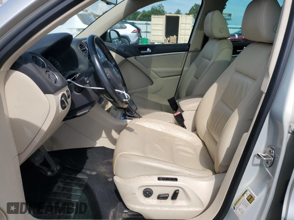 2013 Volkswagen Tiguan S with VIN WVGAV3AX5DW559383, listed as a Copart auction lot 66356005 with 117,271 mi miles and Clean title. Bid and sale history available at DreamBid. Image 7.