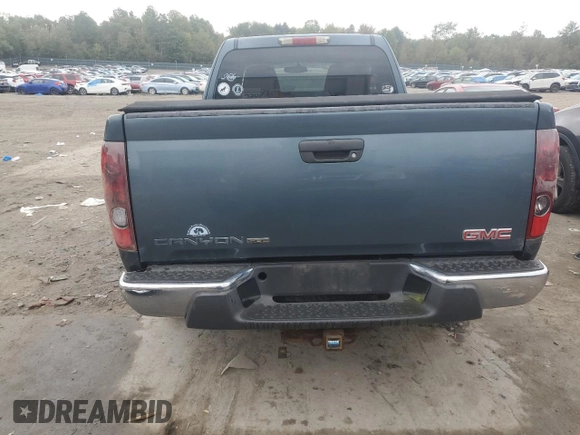 2007 GMC Canyon Work Truck with VIN 1GTDT19E778141575, listed as a Copart auction lot 73715704 with 102,072 mi miles and Salvage Title. Bid and sale history available at carsss.com. Image 6.