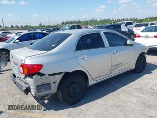 2010 Toyota Corolla with VIN 1NXBU4EE2AZ240438, listed as a IAAI auction lot 42125407 with 185,253 mi miles and . Bid and sale history available at DreamBid. Image 4.
