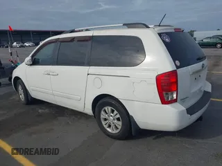 2012 Kia Sedona LX with VIN KNDMG4C7XC6446218, listed as a IAAI auction lot 42083645 with 151,844 mi miles. Bid and sale history available at carsss.com. Image 3.