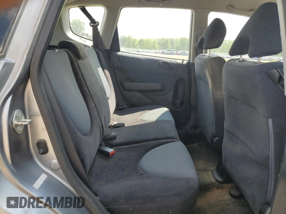 2007 Honda Fit Sport with VIN JHMGD38687S067648, listed as a Copart auction lot 64657345 with 123,055 mi miles and Salvage title. Bid and sale history available at DreamBid. Image 10.