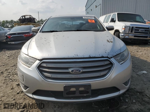 2014 Ford Taurus SEL with VIN 1FAHP2E8XEG184523, listed as a Copart auction lot 67643764 with 157,851 mi miles and Salvage Title. Bid and sale history available at carsss.com. Image 5.