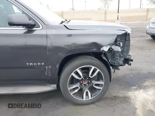2015 Chevrolet Tahoe LT with VIN 1GNSCBKC1FR233898, listed as a IAAI auction lot 42004048 with 115,779 mi miles and . Bid and sale history available at DreamBid. Image 18.