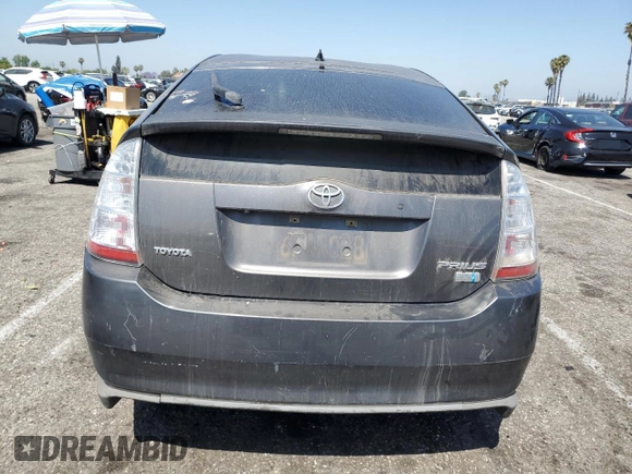2008 Toyota Prius z VIN JTDKB20U983419671, wystawiony jako Copart lot #58446135 z przebiegiem Nie podano mil oraz Szkoda całkowita • Salvage title. Historia ofert i sprzedaży dostępna na DreamBid. Obrazek 6.