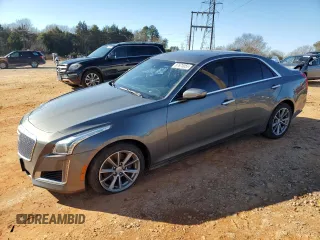 2017 Cadillac CTS Luxury AWD with VIN 1G6AX5SX9H0133510, listed as a Copart auction lot 87673055 with 106,797 mi miles and Salvage title. Bid and sale history available at DreamBid. Image 1.