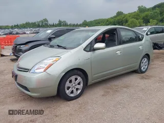 2007 Toyota Prius z VIN JTDKB20U673287354, wystawiony jako IAAI lot #42510185 z przebiegiem 253 448 mil mil oraz . Historia ofert i sprzedaży dostępna na DreamBid. Obrazek 2.