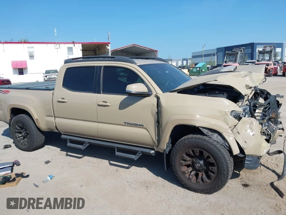2018 Toyota Tacoma SR5 z VIN 3TMDZ5BN4JM039802, wystawiony jako IAAI lot #42300924 z przebiegiem 48 828 mil mil oraz . Historia ofert i sprzedaży dostępna na DreamBid. Obrazek 13.