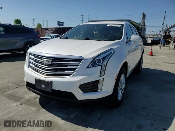 2019 Cadillac XT5 FWD with VIN 1GYKNARS1KZ121732, listed as a Copart auction lot 54882885 with 72,142 mi miles and Salvage title. Bid and sale history available at DreamBid. Image 14.