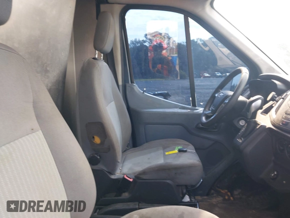 2019 Ford Transit z VIN 1FTYR3XMXKKB33312, wystawiony jako IAAI lot #42253712 z przebiegiem 68 590 mil mil oraz . Historia ofert i sprzedaży dostępna na DreamBid. Obrazek 5.