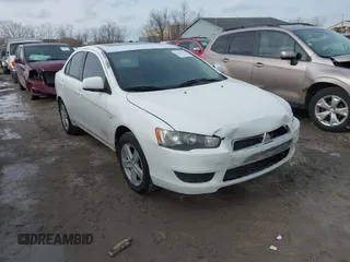 2008 Mitsubishi Lancer DE with VIN JA3AU26U58U033173, listed as a IAAI auction lot 41441335 with 192,036 mi miles. Bid and sale history available at carsss.com. Image 1.