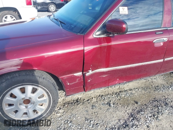 2004 Mercury Grand Marquis LS Premium z VIN 2MEFM75WX4X671041, wystawiony jako IAAI lot #42261517 z przebiegiem 107 182 mil mil oraz . Historia ofert i sprzedaży dostępna na DreamBid. Obrazek 6.