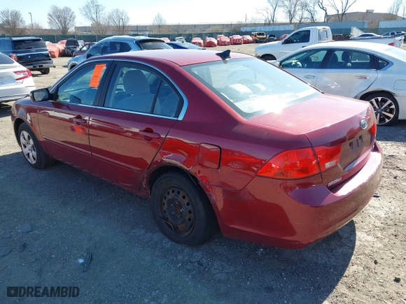 2009 Kia Optima LX with VIN KNAGE228X95314931, listed as a IAAI auction lot 41890304 with 217,901 mi miles. Bid and sale history available at carsss.com. Image 3.