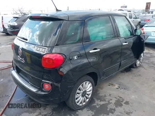 2014 FIAT 500L Easy with VIN ZFBCFABH1EZ001328, listed as a IAAI auction lot 38865855 with Not Provided miles and . Bid and sale history available at DreamBid. Image 4.