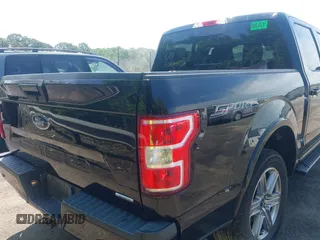 2018 Ford F-150 XL with VIN 1FTEW1EP2JFD51393, listed as a IAAI auction lot 42307408 with 141,478 mi miles and . Bid and sale history available at DreamBid. Image 4.