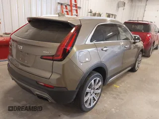 2020 Cadillac XT4 AWD Premium Luxury with VIN 1GYFZDR44LF068018, listed as a IAAI auction lot 41990967 with 11,800 mi miles and . Bid and sale history available at DreamBid. Image 4.
