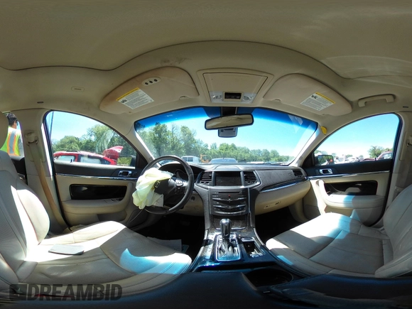 2013 Lincoln MKS z VIN 1LNHL9DK4DG611605, wystawiony jako IAAI lot #42271526 z przebiegiem 204 239 mil mil oraz . Historia ofert i sprzedaży dostępna na DreamBid. Obrazek 21.