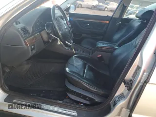 1999 BMW 7 Series 740il with VIN WBAGH833XXDP05142, listed as a Copart auction lot 74104394 with 0 mi miles and Salvage Title. Bid and sale history available at carsss.com. Image 7.