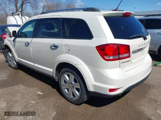 2014 Dodge Journey Limited with VIN 3C4PDCDG6ET105728, listed as a IAAI auction lot 41859746 with 184,335 mi miles. Bid and sale history available at carsss.com. Image 3.