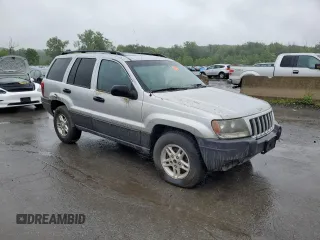 2004 Jeep Grand Cherokee Laredo z VIN 1J4GW48S74C288625, wystawiony jako Copart lot #61290805 z przebiegiem 194 615 mil mil oraz Czysty tytuł • Clean title. Historia ofert i sprzedaży dostępna na DreamBid. Obrazek 4.