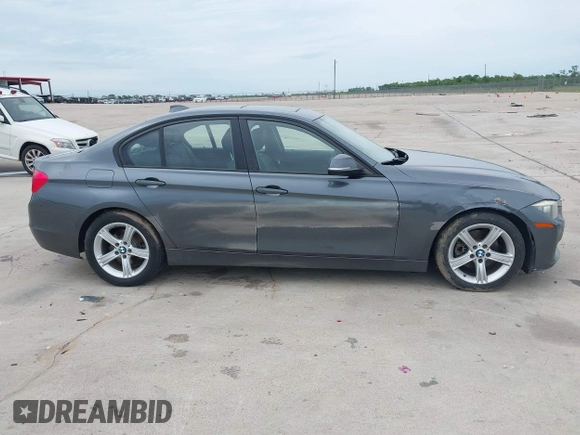 2014 BMW 3 Series 328i with VIN WBA3C1C55EK109175, listed as a IAAI auction lot 42463051 with 153,244 mi miles and . Bid and sale history available at DreamBid. Image 13.