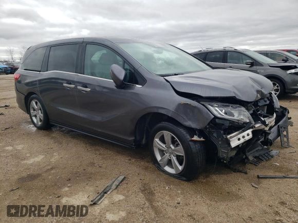 2019 Honda Odyssey EX-L with VIN 5FNRL6H74KB004916, listed as a Copart auction lot 53959205 with 60,100 mi miles and Salvage Title. Bid and sale history available at DreamBid. Image 4.