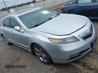 2012 Acura TL Technology z VIN 19UUA9E51CA003464, wystawiony jako IAAI lot #42473718 z przebiegiem 289 358 mil mil oraz . Historia ofert i sprzedaży dostępna na DreamBid. Obrazek 1.