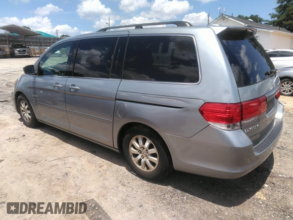 2010 Honda Odyssey EX-L z VIN 5FNRL3H74AB104446, wystawiony jako IAAI lot #42765331 z przebiegiem 319 510 mil mil oraz . Historia ofert i sprzedaży dostępna na DreamBid. Obrazek 3.
