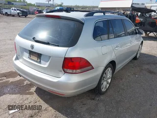 2012 Volkswagen Jetta SportWagen TDI w/Sunroof with VIN 3VWPL7AJ4CM686399, listed as a IAAI auction lot 42036340 with 89,780 mi miles. Bid and sale history available at carsss.com. Image 4.