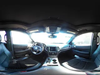 2018 Jeep Grand Cherokee Laredo E with VIN 1C4RJFAG2JC320441, listed as a IAAI auction lot 42095419 with 136,962 mi miles. Bid and sale history available at carsss.com. Image 18.