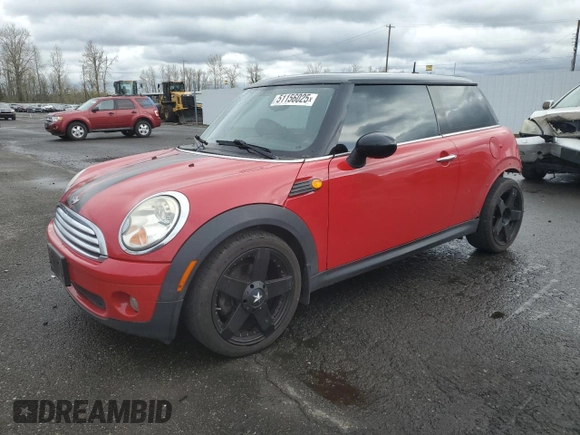 2009 MINI Hardtop with VIN WMWMF33509TU73771, listed as a Copart auction lot 51156025 with 119,622 mi miles and Salvage Title. Bid and sale history available at DreamBid. Image 1.