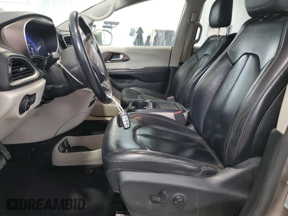 2017 Chrysler Pacifica Touring L with VIN 2C4RC1BG2HR752220, listed as a Copart auction lot 52974835 with 152,239 mi miles and Salvage Title. Bid and sale history available at DreamBid. Image 7.