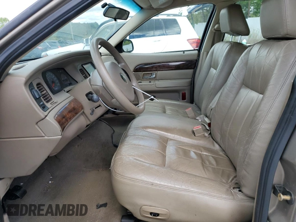 2005 Mercury Grand Marquis GS z VIN 2MEFM74W05X673934, wystawiony jako Copart lot #52608785 z przebiegiem 170 558 mil mil oraz Szkody całkowita. Historia ofert i sprzedaży dostępna na DreamBid. Obrazek 7.