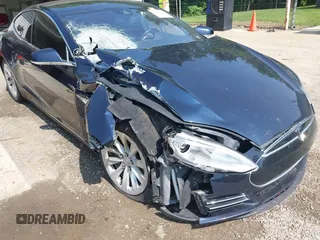 2014 Tesla Model S 60 with VIN 5YJSA1H17EFP65983, listed as a IAAI auction lot 42399288 with 166,365 mi miles and . Bid and sale history available at DreamBid. Image 6.