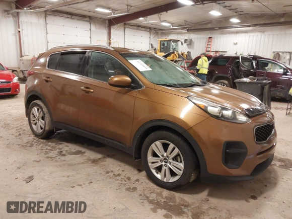 2018 Kia Sportage LX with VIN KNDPM3AC2J7381114, listed as a IAAI auction lot 41214824 with 82,178 mi miles and . Bid and sale history available at carsss.com. Image 1.